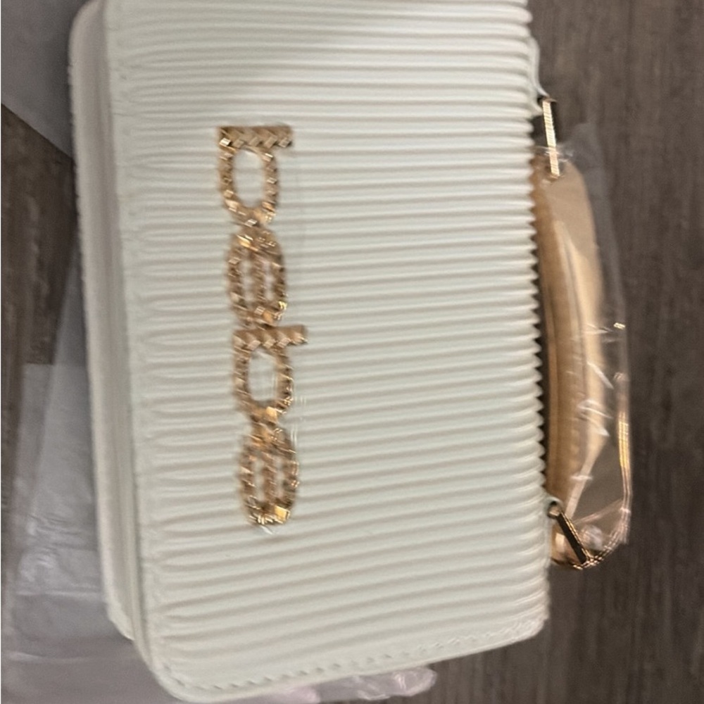 Bebe White Clutch with Gold Accents